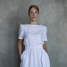 Fitted Dress With Elastic Waistband And Puff Sleeves, Elegant Short Sleeve Dresses With Elastic Waistband, Flowy Dresses With Elastic Short Sleeves, Elegant White Dress With Elastic Waistband, White Dress With Short Gathered Sleeves, White Dress With Fitted Waist And Short Sleeves, White Dresses With Fitted Waist And Short Sleeves, White Flowy Dress With Elastic Waistband, White Relaxed Fit Dress With Puff Sleeves