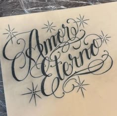 an inked piece of paper with the words amergo and eleno on it