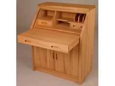 a small wooden desk with drawers on it