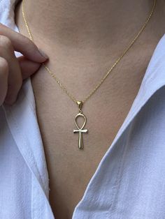 Embrace the timeless allure of the "Ankh Necklace" - a symbol of life, eternity, and spiritual connection. Meticulously crafted with attention to detail, this necklace features an elegant Ankh pendant, a historic emblem that embodies strength and wisdom. Adorned with delicate zircon stones, the design brings a touch of ancient mystique to modern style. Made from high-quality 925 sterling silver with luxurious plating options in gold, rose gold, and silver, this piece radiates sophistication and significance. ✨🕊️ **Specifications - Material: 925 Sterling Silver with 14k Gold Plating - Design: Classic Ankh pendant - Colour Options: Gold, Rose Gold, Silver - Chain Length: 16 inches (40 cm) with a 2-inch (5 cm) extender for a customisable fit Embrace the powerful symbolism of the "Ankh Neckla Ank Necklace, Egyptian Jewellery, Plating Design, Ancient Egyptian Jewelry, Ankh Pendant, The Ankh, Ankh Necklace, Symbol Of Life, Rose Gold And Silver