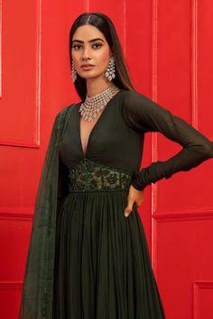 Dark green anarkali with V-neckline, sheer embroidered panel at the waist and full sleeves. Comes with embroidered dupatta. Mahima Mahajan, Green Anarkali, Blouses Designs, Anarkali Dress Pattern, Embroidered Anarkali, Dresses Traditional, Embellished Blouse, Embroidered Dupatta, Party Wear Indian Dresses