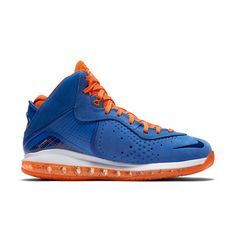 The Nike LeBron 8 QS HWC is a retro basketball shoe that pays tribute to the Cleveland Cavaliers' classic jerseys from the late 1980s. This special edition sneaker features a vibrant blue upper made from a blend of suede and TPU, with contrasting orange accents on the laces and tongue. The shoe's full-length Max Air unit and rubber outsole are also finished in orange, completing the unique look. Orange Basketball Shoes, Airmax 95, Orange Basketball, Retro Basketball Shoes, Retro Basketball, Nike Model, Nike Models, Orange Accents, Nike Lebron