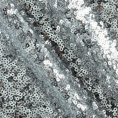 Silver 3mm mini sequin fabric sewed on a 100% polyester mesh fabric offers a unique shimmer and sparkle. Great for decor, drapes, dresses, fashion accessories, costume design, and much more. Disclosure: Color and shimmer can vary by shadow of camera, lighting background, and batch. Fabric is washable. Width for the 3mm sequin fabric is 60" for the mesh and 53/54"for the sequins. White And Silver Bedroom, Silver Bedroom Decor, Gold Pocket Square, Silver Things, Colour Aesthetic, Pearl Fabric, Rainbow Board, Silver Room, Silver Aesthetic