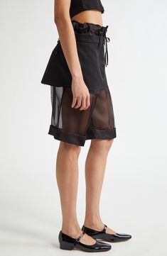 The maison masterfully blurs the lines between art and fashion with suiting-inspired shorts cut from sheer silk and boasting a pencil-style miniskirt overlay. 10" inseam; 24" leg opening; 14" front rise; 14" back rise (size 42IT) Drawstring waist Back button-welt pockets 60% polyester, 40% cotton with 100% silk contrast Dry clean Made in Italy Designer Clothing Designer Clothing Brands, Seersucker Shorts, Knee Length Shorts, Art And Fashion, Twill Shorts, Silk Organza, Layered Skirt, Silk Twill, Black Fits