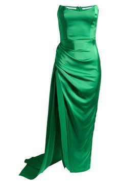 Make an entrance in this floor-sweeping gown fashioned with elegant gathers and a sash detail on the back. 51" center front length; 10" train (size Medium) Strapless Lined 100% polyester Dry clean Made in the USA of imported fabric Floor-length Evening Dress With Ruched Bodice, Green Ruched Floor-length Evening Dress, Floor-length Satin Gown With Pleated Back, Pre-draped Pleated Back Gown For Gala, Pre-draped Gown With Pleated Back For Gala, Pre-draped Fitted Bodice Floor-length Evening Dress, Floor-length Pre-draped Fitted Bodice Evening Dress, Pre-draped Floor-length Evening Dress With Fitted Bodice, Formal Ruched Full-length Evening Dress