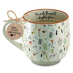 a coffee mug with a tag that says, you make the world a brighter place