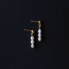 When the occasion calls for a little something extra, our mini Pearl Earrings are the perfect fit. These lightweight earrings are a striking drop style with freshwater pearls.A classic piece of timeless jewelry, these would be the perfect gift for a bride or bridesmaid Details: Size: .75” ling Earring post material: 14k gold fill (100x more real gold than plated materials), perfect for those with sensitivities All profits from the sale of our ethically made jewelery are donated to charity, you c Gift For A Bride, Stop Human Trafficking, Second Piercing, Earring Post, Simple Tees, Lightweight Earrings, Donate To Charity, Timeless Jewelry, Iron Decor