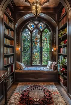 a room that has some bookshelves and a rug on the floor in front of it