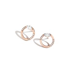 The 2018 Diamond Foundry Deco Capsule draws inspiration from the decadence of the roaring 20’s, made anew by fashioning the deco silhouettes into minimal designs better fit for the 2020s. Asymmetrically set hoop studs feature nine scoop set brilliant diamonds and a 1/3 carat Marquise diamond at the eye of each earring. Sold as a pair. Size: 14mmStones: Cultivated White Diamonds - .86 TCW Please note, diamonds used are top quality - all will be VS-VVS clarity / F-G color. Learn more about diamond Roaring 20, Bespoke Jewellery, Marquise Diamond, 3 Carat, Rose Gold Diamonds, Brilliant Diamond, Pendant Set, White Diamonds, Diamond White