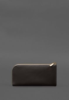 The Leather Wallet with Zipper combines functionality, comfort, and aesthetic appeal. This wallet is handcrafted with precision, ensuring high-quality craftsmanship. Inside, the wallet features two compartments for bills, one coin pocket, and a dedicated card slot. Made from premium genuine leather, it retains its original look and durability over time. Its minimalist design makes it a great fit for both men and women. This wallet makes an excellent gift for anyone who appreciates quality and th Formal Brown Wallet With Zipper Pouch, Classic Coin Purse With Zipper Pocket, Classic Everyday Coin Purse With Zipper Pocket, Classic Coin Purse With Zipper Pocket For Daily Use, Modern Coin Purse With Zipper Pocket, Modern Wallet With Zipper Pocket, Formal Pouch Wallet With Zipper Closure, Modern Rectangular Wallet With Zipper Pocket, Modern Bifold Bag For Gift