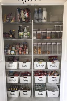 an organized pantry with white bins filled with food and labeled labels on the shelves