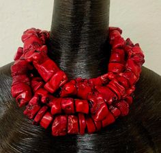 This is a very bold, chunky and heavy red branch coral nugget triple strand statement necklace that I just found and discovered I had not listed it. The corals are dramatic enough to stand on their own without any further embellishments. This adjusts from 19-22" and it does have some weight. If it's too much for you, you can remove one of the strands from the back by snipping the beading wire with a small scissors. The back is furnished with silver tone hardware and hammered silver tone leaves. Red Coral Jewellery, Coral Jewellery, Jewelry Vendor, Jewellery Shop Design, Art Statement, Turquoise Western, Shell Choker, Long Statement Necklace, Pagan Jewelry