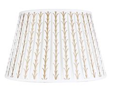 a white lamp shade with gold lines on it