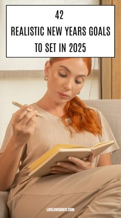 a woman sitting on a couch holding a pen and looking at a book with the title 42 realistic new years goals to set in 205 ages