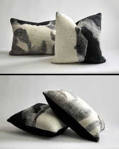 two pillows with black and white designs on them