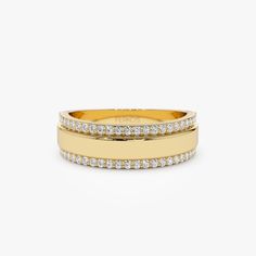 a yellow gold ring with three rows of diamonds on the inside and outside of it