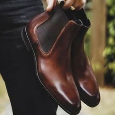 Luxury handcrafted leather shoes crafted with premium quality leather. All inner and outer parts including sole made of genuine leather. Every item we produce has a piece our love, our soul. To find out your exact US size, take a look at our size chart. We are offering free shipping World-wide to all our valued customers. Please note, We make - Made to Order handcrafted leather shoes and it will take 2 to 3 weeks to complete. We ship our products using FedEx / DHL Express and typically it takes 5 to 7 business days to deliver World-wide. There may be a slight variation in color due to photography light effects and computer color resolution but colors will be used matching the originals. Please feel free to get in touch if there is any query about the product. Our team will be delighted to Mens Brown Leather Boots, Handmade Leather Boots, Quality Leather Boots, Brown Chelsea Boots, Custom Design Shoes, Botas Chelsea, Vintage Man, Ankle Boots Men, High Ankle Boots