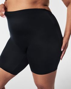 This low-back mid-thigh short provides firm compression to shape and support your figure. Designed with cling-free fabric and an innovative low-back design, it goes undetected beneath your most daring backless dresses and special occasion outfits. Plus, with a no-slip silicone waistband that doesn't roll or fold, free-cut hems that don't squeeze or dig, and fabric that prevents thigh chafing, it's your go-to for all-night comfort—and for those very specific silhouettes that require very specific High Stretch Shapewear With Built-in Shorts, Fitted Shorts With Built-in Padding, High Stretch Smoothing Biker Shorts, Smoothing High-stretch Biker Shorts, Workout Shapewear With Built-in Shorts, Compression Shapewear With Built-in Shorts, Compressive Smoothing Shorts, Fitted Seamless Shapewear With Short Inseam, Compression Smoothing Biker Shorts