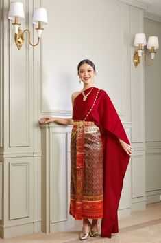 Our beautiful traditional Thai outfits are perfect for weddings, cultural events, Songkran festivals, or any occasion.  They are exclusively handmade with premium Thai silk & handwoven fabric. This set includes: 1 Free Size Silk Sabai Top 1 Free Size Patterned Skirt (can be worn with safety pins or hooks) 1 Set of hooks   This set does not include jewelry or accessories, they are available separately in our store. -- Check out our YouTube videos on how to wear your Thai dress: www.youtube.com/watch?v=jndYR-WrOuE www.youtube.com/watch?v=Eki5aUTxBBI&t=28s -- ชุดไทย, Thai attire, Thai costume, traditional Thailand clothing, that outfit, traditional Thai outfit, traditional Thai clothing, chut Thai, Thai wedding attire, Thai wedding dress, Thai traditional dress, Cambodian dress, Khmer dress, Luxury Chinon Traditional Wedding Wear, Cheap Bollywood Traditional Wear For Puja, Luxury Traditional Wear For Ceremonies, Luxury Traditional Sets For Ceremonial Occasion, Luxury Ceremonial Suits For Festivals, Cheap Traditional Wear For Ceremonies And Festivals, Luxury Royal Traditional Wear For Festive Occasions, Balinese Temple Dress, Luxury Sets For Traditional Ceremonies And Festivals