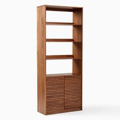 a wooden bookcase with drawers on the front and bottom shelves, against a white background