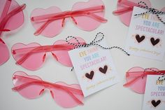 valentine's day cards with pink heart shaped glasses tied to string and tags on them