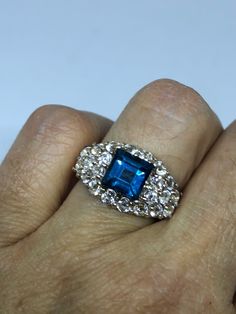 Vintage Genuine London Blue Topaz 925 Sterling Silver Ring https://www.etsy.com/listing/609116453/vintage-genuine-london-blue-topaz-925 Blue Princess Cut Jewelry With Diamond Accents, Blue Diamond Rings With Sparkling Stones, Vintage Blue Halo Setting Jewelry, Vintage Blue Jewelry With Halo Setting, Blue Sterling Silver Rings With Sparkling Stones, Blue Topaz Jewelry With Stone Setting, Blue Gemstone Jewelry With Princess Cut, Blue Gemstone Jewelry Princess Cut, Anniversary Blue Sapphire Ring With Stone Setting