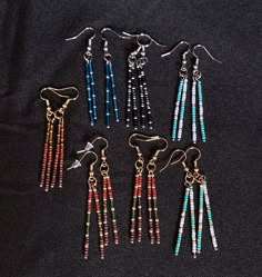 You'll fall in love with these modern seed bead dangle earrings!  Both strands of fringe are a bit different adding to the visual interest of the earrings.  Every pair is multi color, some being Ombre, are lightweight, and made from quality Toho beads.  The silver earrings are stainless steel, which is naturally hypoallergenic and non-corrosive, and the gold earrings are 18K plated. The beaded part of the earrings are 1 3/4", total length 2 3/4" Color options are in the same order as the photos. Beaded Fringe Earrings Pattern, Seed Bead Fringe Earrings, Bead Fringe Earrings, Ombre Earrings, Bead Dangle Earrings, Bead Fringe, Stick Earrings, Beaded Earrings Diy, Toho Beads