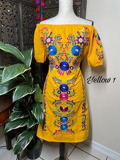 "Beautiful Floral Embroidered Dress - Handmade Embroidered Mexican Dress - Artisan Made Dress Beautiful hand embroidered dress! This has been made and brought directly from Puebla, Mexico. The dress has extremely detailed embroidery. The embroidery is 100% handcrafted. All the work on this dress has a professional skilled finish and the multicolor embroidered makes it look even more eye catching. The embroidery work is made with great quality thread. The eye catching will be on the embroidered w Festive Yellow Embroidered Dress With Floral Details, Traditional Resham Embroidered Dress For Spring, Festive Yellow Dresses With Floral Embroidery, Multicolor Embroidered Folk Fabric For Spring, Summer Festival Floral Embroidered Fabric, Folk Style Multicolor Embroidered Fabric For Spring, Folk Style Embroidered Dress For Spring Festive, Folk Style Embroidered Spring Festive Dress, Summer Folk Style Multicolored Embroidered Fabric