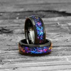 two wedding bands with colorful flowers on them