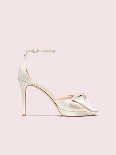 Bridal Bow Sandals | Kate Spade New York Closed Toe Sandals With 4-inch Heel For Gala, Luxury Wedding Shoes With 4-inch Heel And Ankle Strap, Elegant Sandals With 4-inch Heel And Ankle Strap, Leather Sandals With 4-inch Heel For Gala, Leather Wedding Shoes With 4-inch Open Heel, Chic Ankle Strap Platform Wedding Shoes, Chic Wedding Shoes With Heel Strap And Open Heel, Elegant Closed Toe Sandals With Heel Loop, Chic Platform Wedding Shoes For Evening