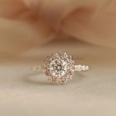 Blooming Flower Engagement Ring, Pink Sapphire Promise Rings, Sunflower Halo Diamond Ring, Art Deco Daisy Ring, Custom Birthstone Rings We use the highest quality moissanite! Moissanite: ✦ Color: D Colorless ✦ Clarity: VVS1 OR All our diamonds are 100% natural. We use only conflict-free diamonds and gemstones. Diamond: ✦ Color: F-G ✦ Clarity: SI1-VS ✦PRODUCT DETAILS✦ → center stone: moissanite; 0.50ct → accent stone: moissanite; natural pink sapphire Also available in other colored gemstones upo White Flower Cubic Zirconia Ring, Round Flower Ring With Halo Design For Anniversary, White Flower-shaped Diamond Ring With Halo Setting, Diamond White Flower Ring With Halo Setting, Rose Gold Flower-shaped Rings With Cubic Zirconia, Rose Gold Flower-shaped Cubic Zirconia Rings, Flower-shaped Anniversary Rings With Accent Stones, Flower Shaped Cluster Ring Gemstone For Promise, Flower Shaped Rings With Accent Stones For Anniversary