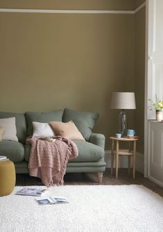 Green sofa, yellow armchair and pink throw Thatched House, Corner Chaise, Patterned Rug, Sofa Fabric, Sofa Frame, Choose Your Style