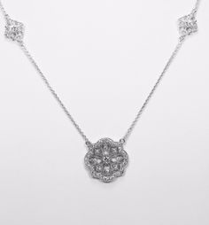 "14k white gold milgrain diamond necklace Type: Diamond Shape: Round (approx. 0.50ct) Color: G-H Quality: SI1 Setting: pave set Pendent is 16.5mm Length of chain is 17.5\"+ METAL: Material: 14K White Gold Model # D813NGAB Only natural, non-conflict diamond are used. An appraisal for insurance purposes can be available upon request. Custom alterations may be made upon request. Daniel's Creations has been in business since 2002, established by a family of jewelers with decades of experience in the Classic Formal Diamond Necklace With Intricate Design, Classic Diamond Necklace With Filigree Design, Classic Diamond Necklace With Filigree, Classic Diamond Filigree Necklace, White Gold Diamond Necklace With Filigree, Classic Diamond Filigree Necklaces, Milgrain Diamond Jewelry In White Gold, Classic Silver Diamond Necklace With Filigree, White Gold Diamond Jewelry With Milgrain Detail