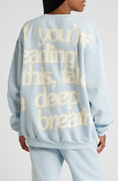 Take a deep breath and relax in a cozy, oversized sweatshirt featuring soothing colors and positive messages at the front and back. Crewneck Long sleeves 50% cotton, 50% polyester Machine wash, dry flat Imported Mayfair Group Sweatshirt, Sweat Set Design, Words Of Affirmation Hoodie, Self Love Sweatshirt, Trending Sweatshirt Designs, Comfy Gifts, Girly Sweatshirt, Sweatshirt Sayings, The Mayfair Group