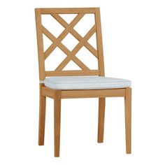 a wooden chair with a white seat cushion