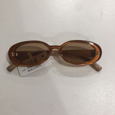 Le Specs Light Brown Small Oval Sunglasses. Condition is New with tags. Shipped with USPS Ground Advantage. Gen Z Sunglasses, Early 2000s Sunglasses, Aesthetic Sunglasses Vintage, Vintage Designer Sunglasses, Fun Glasses Frames, 90s Sunglasses Vintage, Small Oval Glasses, Iconic Glasses, Slavic Winter