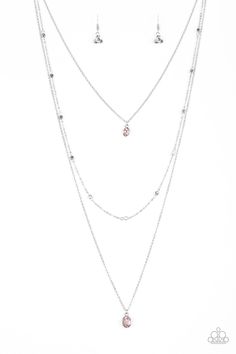 Three dainty silver chains layer down the chest. A glittery pink gem pendant swings from the uppermost chain, giving way to a shimmery silver chain embellished in glistening cube beading. Slightly larger in size, a matching pink gem pendant swings from the lowermost chain for a glamorous finish. Features an adjustable clasp closure. Sold as one individual necklace. Includes one pair of matching earrings. P2RE-PKXX-160XX Cheap Pink Metal Chain Necklace, Silver Dangle Charm Necklaces For Party, Trendy Silver Square Pendant Jewelry, Pink Sterling Silver Charm Necklace With Adjustable Chain, Elegant Pink Metal Chain Necklace, Silver Pendant Crystal Necklace With Beaded Chain, Silver Layered Beaded Chain Necklace, Silver Beaded Chain Layered Necklace, Trendy Pink Sterling Silver Necklaces