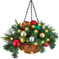 a hanging basket filled with ornaments and lights