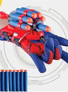 a spider man toy with six blue and orange balls