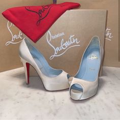 Iconic Limited Edition White Ivory Crepe Satin Hyper Very Priv 120 Christian Louboutin Bridal Collection Platform Heels With Blue Inner Soles In Pristine Condition. Will Include Box And Bag. They Have New Tips And Non-Slip Soles. #Bridalcollection #Louboutinweddingshoes #Christianlouboutinlimitededition #Christianlouboutinbluesoles #Limitededition #Christianloyboutinwedding #Ivorysatin #Limitededition#Bluesoles Luxury 4-inch Cream Heels, Chic Wedding Heels With Red Sole, Luxury Cream Open Toe Wedding Shoes, Luxury Open Heel Wedding Shoes, Luxury White Wedding Shoes With Padded Heel, Luxury Wedding Shoes With Padded Heel And Round Toe, Luxury Open Heel Wedding Shoes With Branded Heel Counter, Designer Wedding Heels With Sculpted Heel, Luxury Fitted Wedding Shoes With Padded Heel