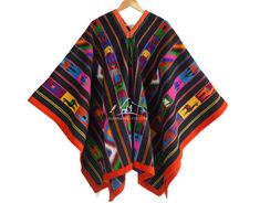 "Unique Peruvian Poncho forms intricate geometric patterns in natural colors. This traditional-style unisex poncho from Peru. It features stunning, intricately woven designs that date back to before the Inca empire, showcasing the skill of the weaver, which is passed down from generation to generation. Poncho unique, there is no other like it. Handmade on a loom. Traditional poncho from Ayacucho, Peru. Size: 65\" L x 58\" W - (165 x 145 cm)" Traditional Handwoven Poncho For Fall, Traditional Festival Poncho With Woven Motifs, Handmade Bohemian Alpaca Poncho, Bohemian Alpaca Shawl, Handmade Alpaca Bohemian Poncho, Traditional Black One-size Poncho, Traditional Winter Poncho, Traditional Alpaca Poncho For Fall, Bohemian Alpaca Shawl Cape