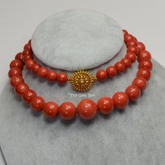 DESCRIPTION: Thank you for coming in! Spectacular 18K solid gold necklace with Mediterranean Sardinia Coral sphere beads, no dye, 100% natural tomato red color. 9.5mm-17.15mm large coral beads, 128 grams with a beautiful 18k solid gold clasp~Our favorite color for coral! The beads are premium quality, you do not find hairline cracks which are common with Mediterranean coral beads. Accompanied with GIA report number 2191866911 to assure your investment! You'll get the necklace you see! SIZE of co Formal Single Strand Red Coral Necklace, Elegant Red Coral Jewelry With 8mm Beads, Elegant Orange Jewelry With 8mm Beads, Elegant Red Coral Round Bead Necklace, Elegant Red Coral Round Bead Necklaces, Luxury Red Coral Necklaces, Luxury Red Coral Necklace, Yellow Gold Necklaces With 8mm Round Beads, Yellow Gold Necklaces With 8mm Beads