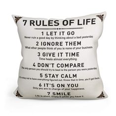 a pillow with the rules of life printed on it