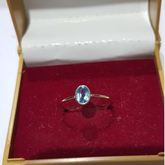 14k solid yellow gold natural oval shaped blue topaz semi precious gemstone ring. 1. The weight of the natural blue topaz gemstone used in the ring =0.50 cts. 2. The weight of the 14k solid yellow gold used in the ring =0.810 grms. The blue topaz gemstone is the birthstone for the people born in the month of November. The ring is very nice and beautiful. Thanks Dainty Oval Topaz Gemstone Ring, Dainty Oval Topaz Ring, Oval Blue Topaz Yellow Gold Jewelry, Oval Yellow Gold Blue Topaz Jewelry, Oval Yellow Gold Topaz Gemstone Ring, Formal Oval Blue Topaz Birthstone Ring, Fine Jewelry Oval Blue Topaz Ring, Oval Blue Topaz Fine Jewelry Ring, Oval Topaz Birthstone Ring In Yellow Gold