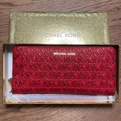 Michael Kors Crimson Jet Set Travel Continental Zip Around Long Wallet 100% Authentic Features: - Material: Polyester, Canvas, Glitter - Color: Red (Crimson) - Zip-Around - Multiple Credit Card Slots And Cash Holders Inside Measurements: 8.25" X 4'' X 0.75" 8/24/23#3-2 Luxury Michael Kors Bifold Bags, Michael Kors Rectangular Wallet For Formal Occasions, Luxury Michael Kors Wallets For Formal Occasions, Michael Kors Luxury Evening Wallets, Luxury Michael Kors Evening Wallets, Michael Kors Formal Rectangular Wallets, Cheap Red Wallets With Multiple Compartments, Michael Kors Luxury Formal Wallets, Michael Kors Designer Leather Wallet