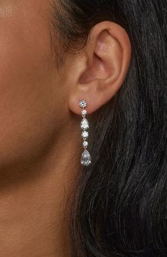 Complete your look with the sparkling glamour of these linear drop earrings set with faceted stones. 1 5/8" drop; 1/4" width Post back Rhodium or 18k-gold plate/cubic zirconia Imported Formal Silver Jewelry, Formal Dangle Linear Earrings With Sparkling Stones, Sparkling Cubic Zirconia Linear Dangle Earrings, Long Drop Cubic Zirconia Chandelier Earrings For Formal Events, Classic Long Drop Cubic Zirconia Diamond Earrings, Classic Long Drop Diamond Earrings In Cubic Zirconia, Linear Drop Earrings With Sparkling Cubic Zirconia Stones, Long Drop Linear Earrings With Diamond Accents, Sparkling Linear Drop Earrings For Formal Occasions