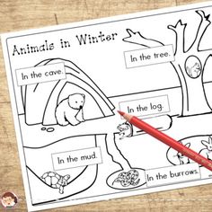 an animal in winter worksheet with a red pencil on the table next to it