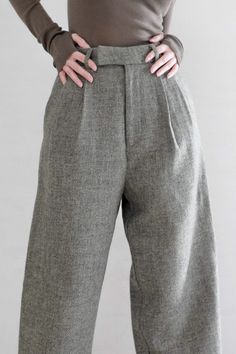 Made with 100% wool, these wide leg pants are a must-have for winter. They drape beautifully. and is soft to the touch. These wool pants features a zipper and button closure. Style #: WWAH909 Trousers For Winter, Elegant Wool Wide Leg Pants For Spring, Elegant Wide Leg Wool Pants For Spring, Chic Wool Wide Leg Pants With Welt Pockets, Chic Wool Wide Leg Dress Pants, Formal Wool Wide Leg Pants For Spring, Fall Wide-leg Dress Pants For Tailoring, Spring Wool Wide Leg Workwear Pants, Wool Wide Leg Pants For Workwear In Spring