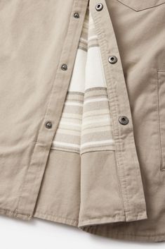 The Campbell Jacket is a 100% cotton button-down made from a canvas shell that offers a custom flannel body liner, poly sleeve liner, corduroy collar& gussets. Side welt pockets and patch chest pockets. 100% cotton canvas shell Corduroy collar Striped cotton flannel body lining Front snap closure Side welt& chest pockets | Campbell Jacket Men's Size Large Cotton in Olive by Katin Custom Flannel, Pant Shirt, Cotton Flannel, Swim Shorts, Welt Pocket, Bottoms Pants, Welt Pockets, Shirt Jacket, Snap Closure