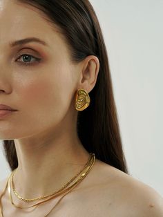 Step into a world of elegance with our Spiral Stud Earrings. These gold-textured, geometric beauties bring a touch of abstract art to your everyday look. Their unique circle design spirals with charm, making them a perfect gift. Elegant Spiral Wrap Earrings, Gold Spiral Earrings For Gifts, Modern Spiral Hoop Earrings As Gift, Elegant Spiral Hoop Earrings For Gift, Elegant Spiral Hoop Earrings As Gift, Minimalist Spiral Jewelry With Matching Earrings, Gold Spiral Earrings As Gift, Gold Spiral Wrap Single Earring, Gold Minimalist Spiral Wrap Earrings